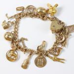 Lot 222 9ct Gold Charm Bracelet